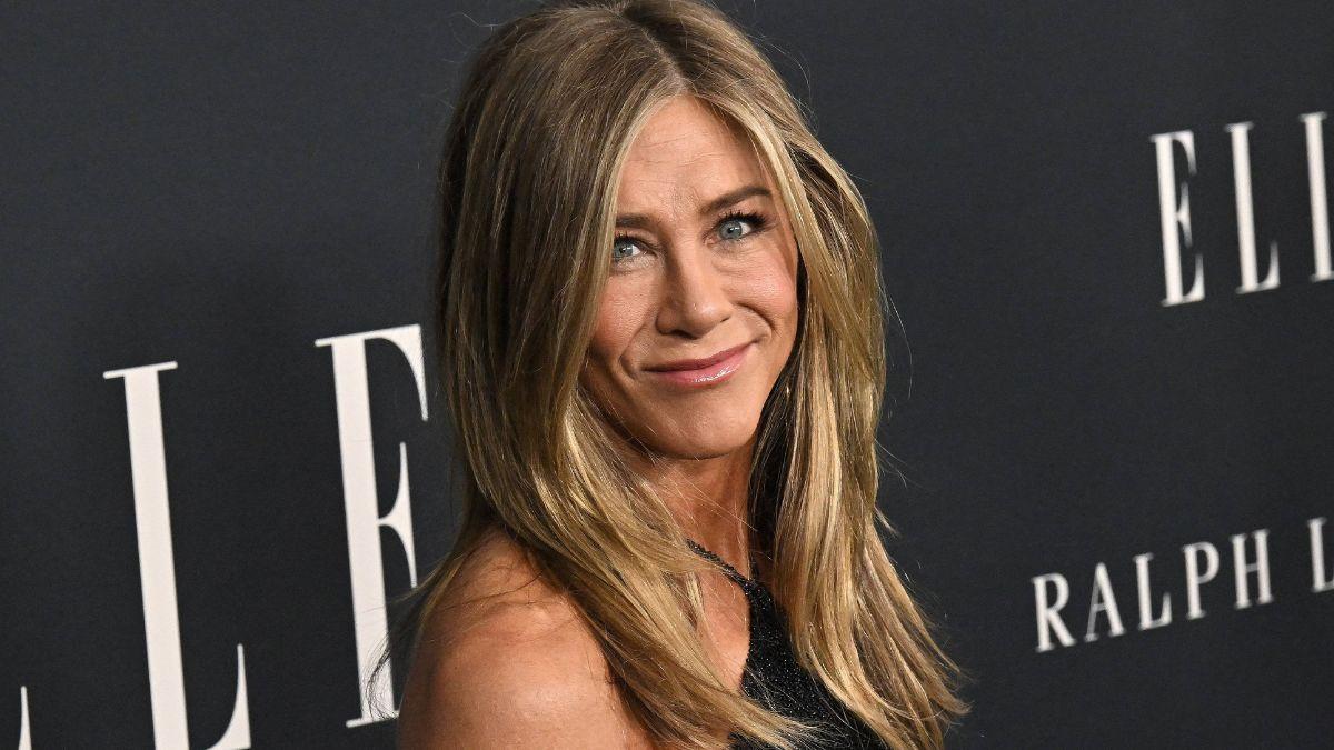 The staff member declined, saying she was happy working with Aniston.