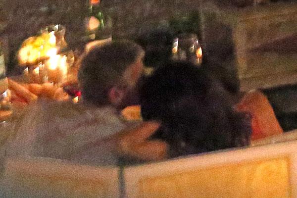 //george clooney amal clooney dinner italy kiss hold hands