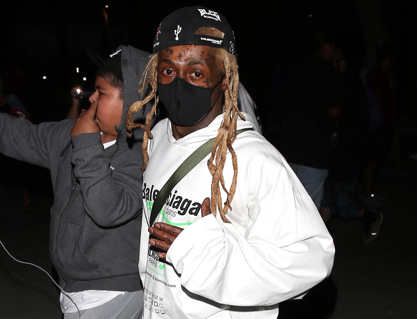 lil wayne security guard demands criminal charges gun incident police investigating