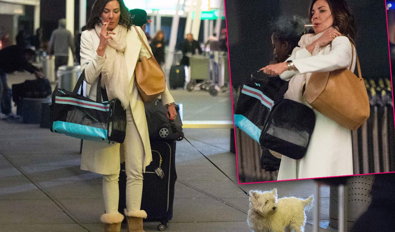 Luann De Lesseps Smokes Cigarette After Flight To NYC