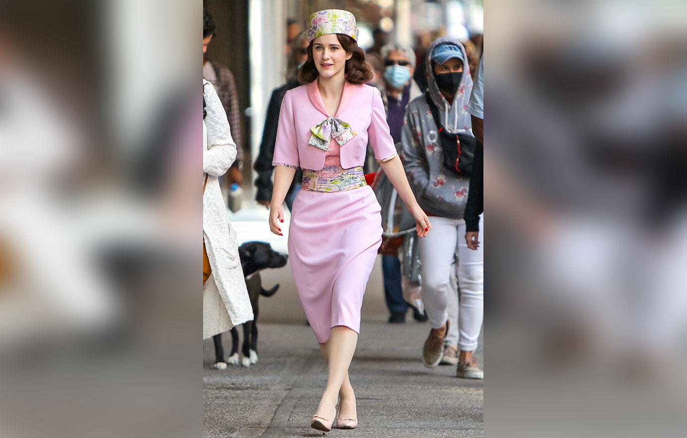 rachel brosnahan filming the marrvelous mrs maisel in pink outfit