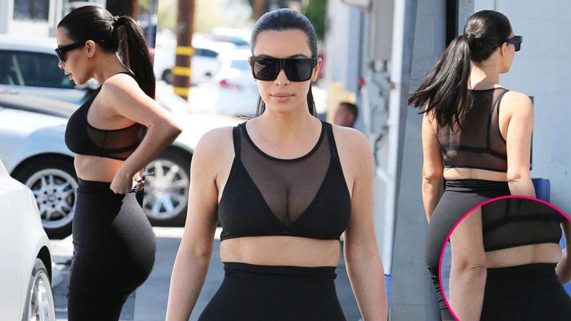 So Much Back Fat! Kim Kardashian's Rolls Emerge From Her Skirt In