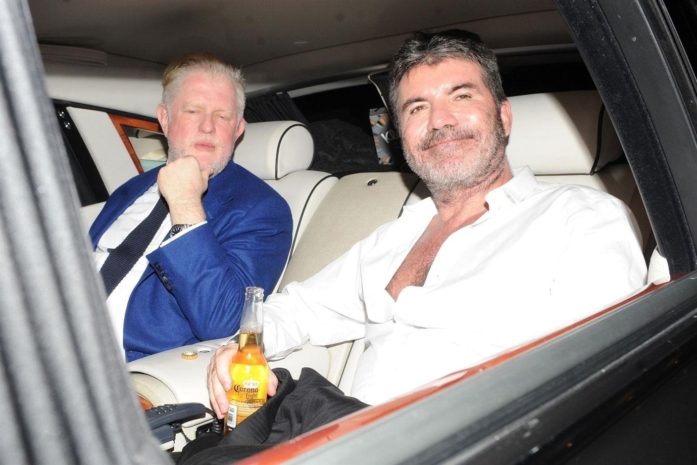 //Simon Cowell drinking after hospital