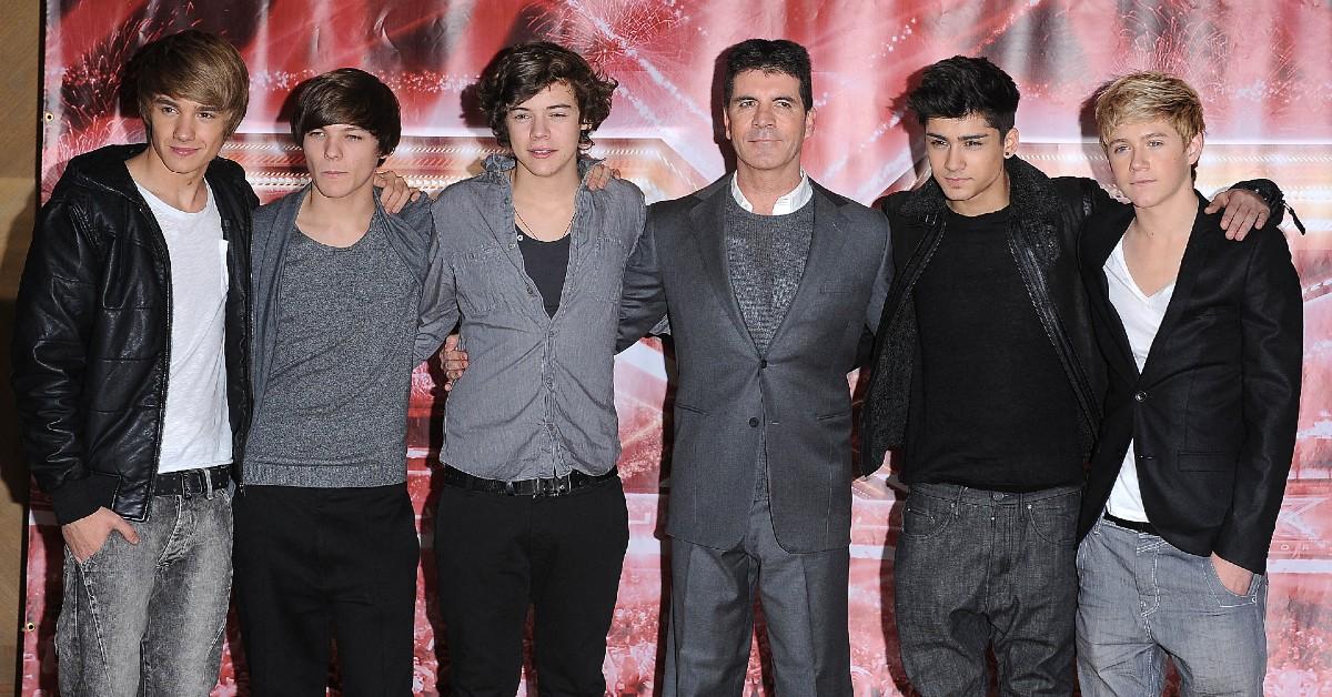 Photo of SImon Cowell and One Direction