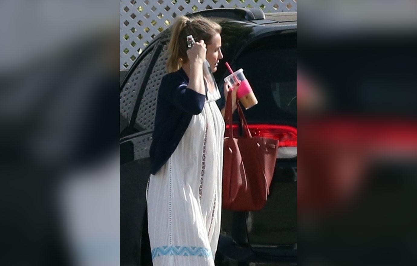 Cameron Diaz Desperately Trying To Hide Baby Bump In Grotesquely Oversized Clothes