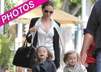 //angelina jolie takes twins shopping