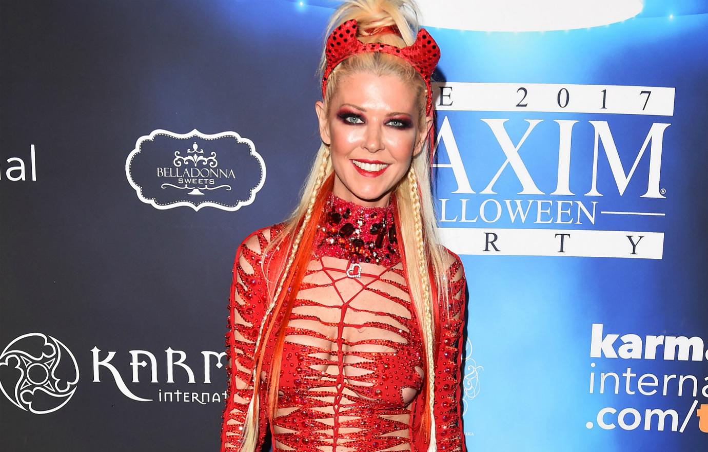 The devil made Tara Reid dress this way for her celebrity Halloween costume.