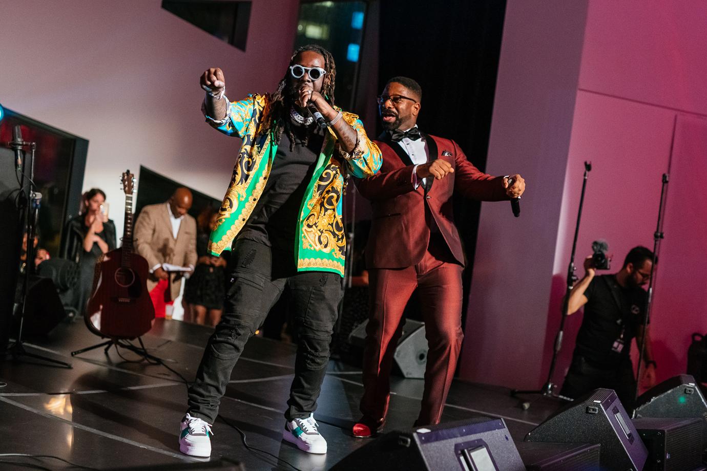 T-Pain and DJ Irie bust a move during an impromptu performance at the Love Tito’s InspIRIE Gala to kick off DJ Irie's 15th annual Irie Weekend in Miami Beach, FL.