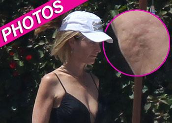 //maria shriver cellulite bathing suit splash