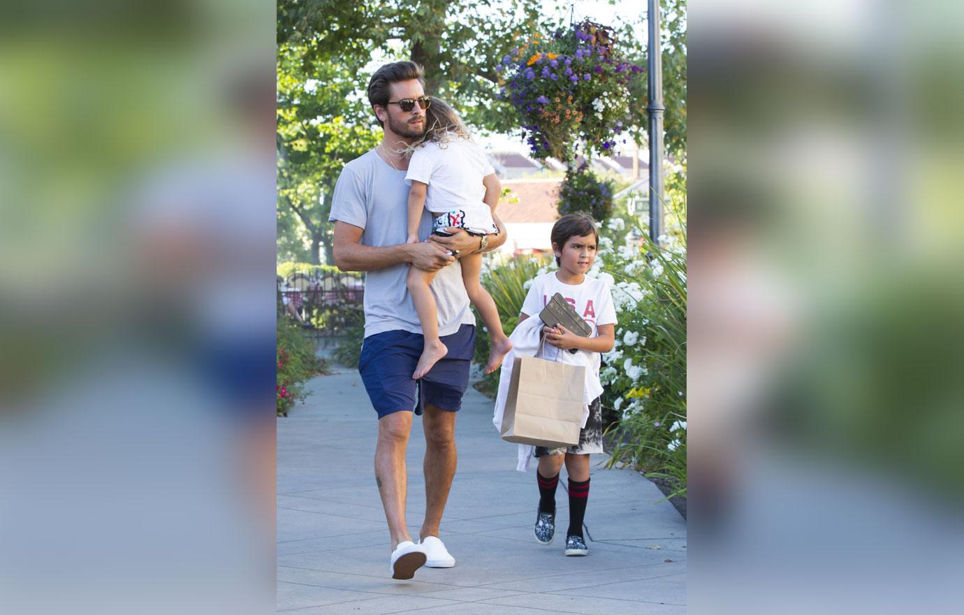 scott disick carrying kourtney