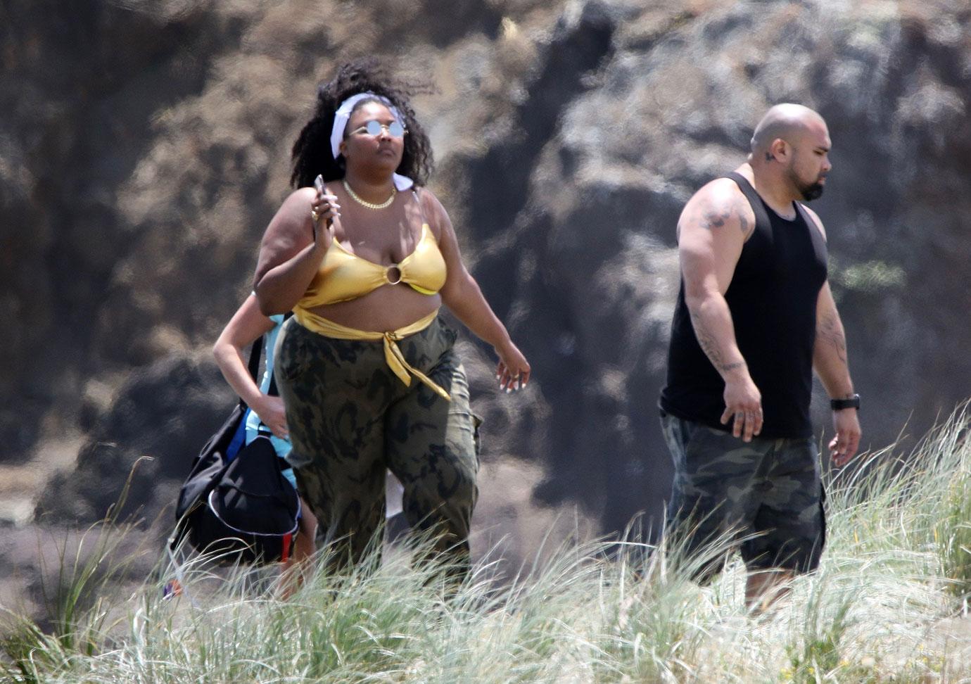 Lizzo Shows Off Curves In Gold Bikini During Beach Day: Photos