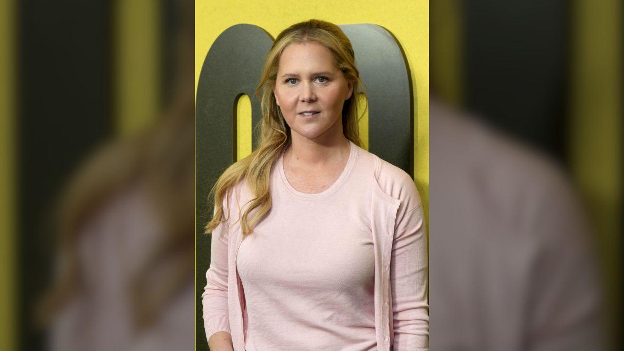 According to Arnett, Amy Schumer introduced Madonna for a surprise stand-up appearance.