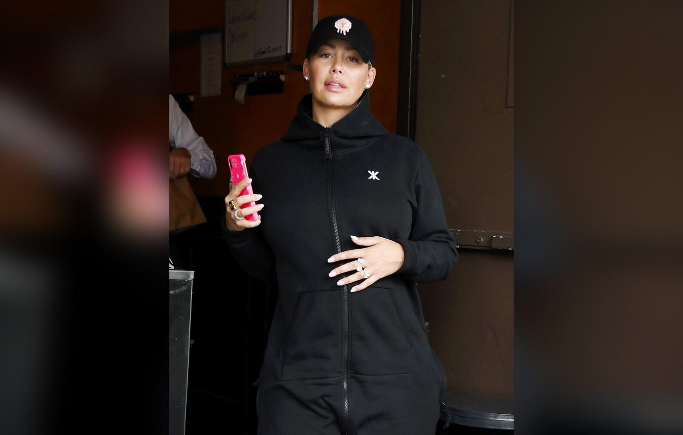 Amber Rose Looks Serious As She Walks Holding Her Baby Bump Andy Cohen's Nastiest Feuds Exposed