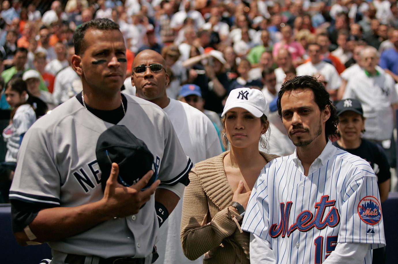 Actress Jennifer Lopez and husband Marc Anthony with New York Yankee Alex Rodriguez before a subway series game between the New York Mets and the New York Yankees at Shea Stadium in Queens, New York.