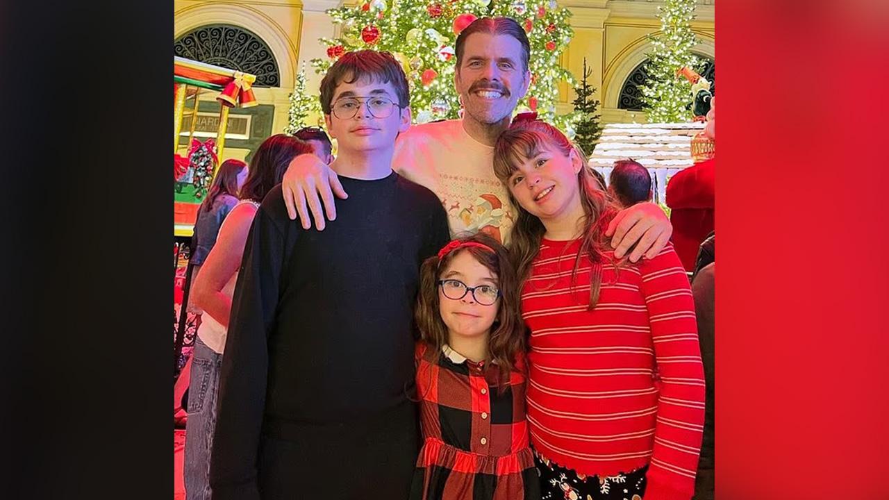 Photo of Perez Hilton with kids