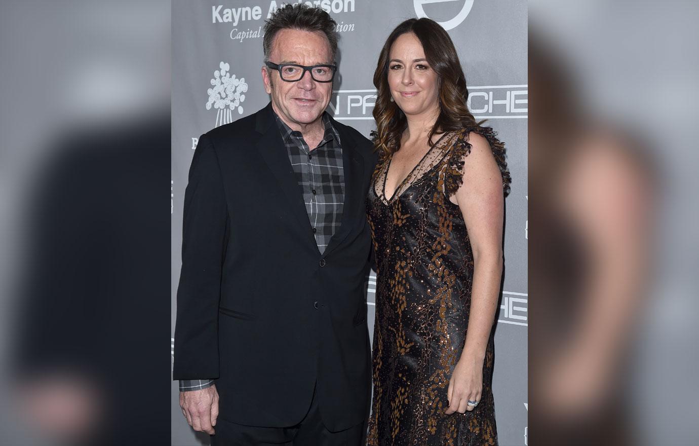 tom arnold divorce fight ex wife  million