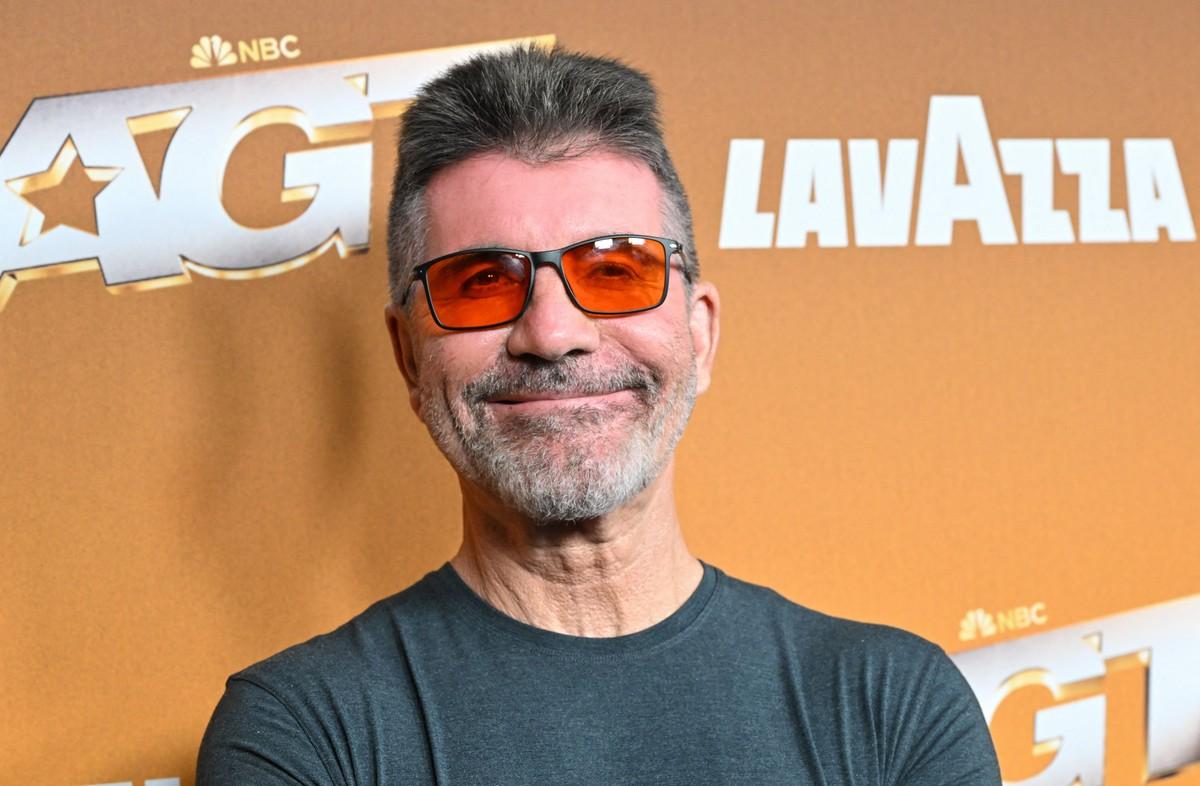 Simon Cowell said his surgeon once feared he might never walk again after his back injury.