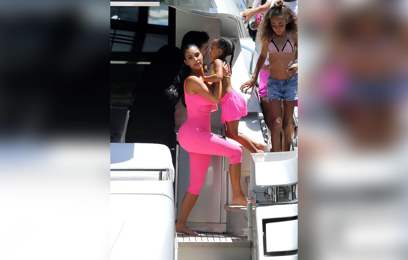 Kim Kardashian Shows Off Curves In Pink Bodysuit