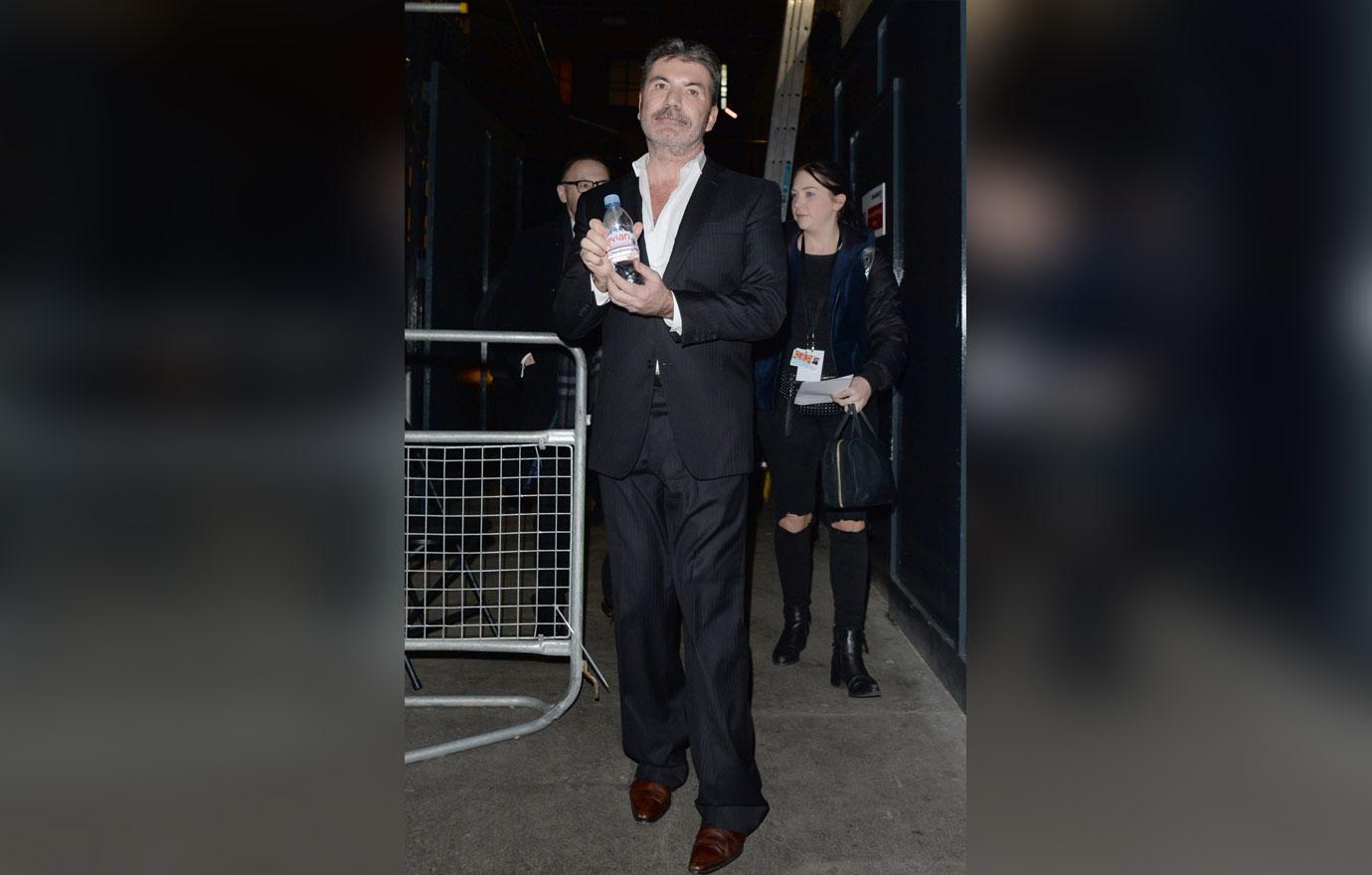 Simon Cowell Steps Out After Health Scare Fall