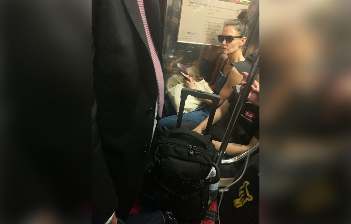 Katie Holmes Rides NYC Subway in Overalls and Sunglasses