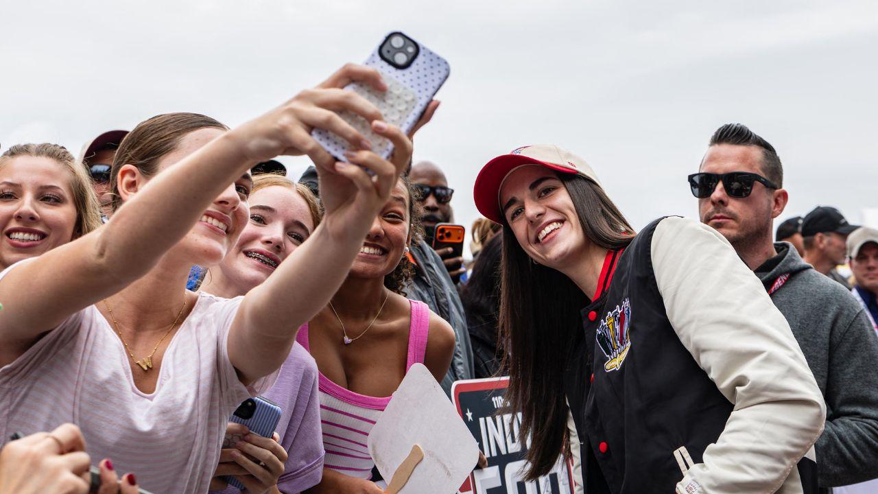 A photo of Caitlin Clark with fans