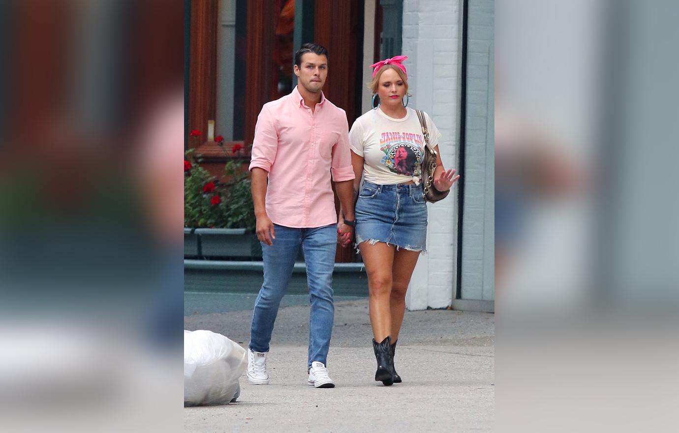 Miranda Lambert and Husband Brendan McLoughlin Seen Walking Holding Hands Outside In Matching Pink and Denim Outfits