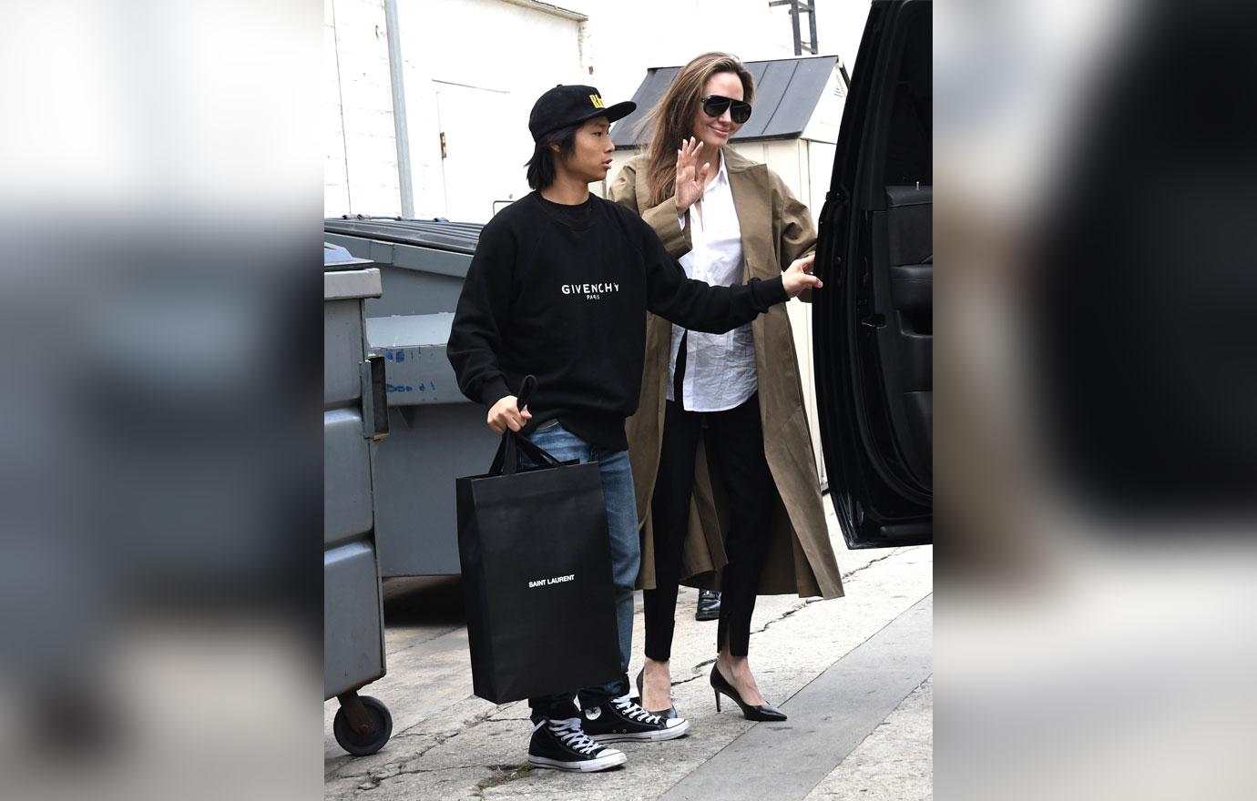 //angelina jolie pax shop after brad returns to jennifer anistons side