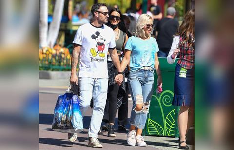 brian austin green girlfriend sharna dwts disneyland photos megan fox shade mgk punches fan