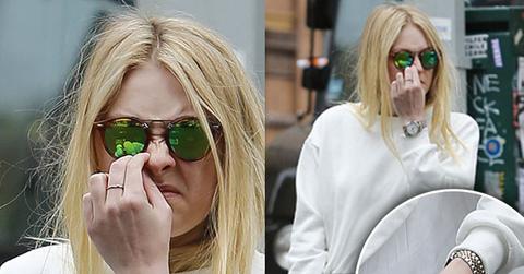 dakota fanning picking nose nyc