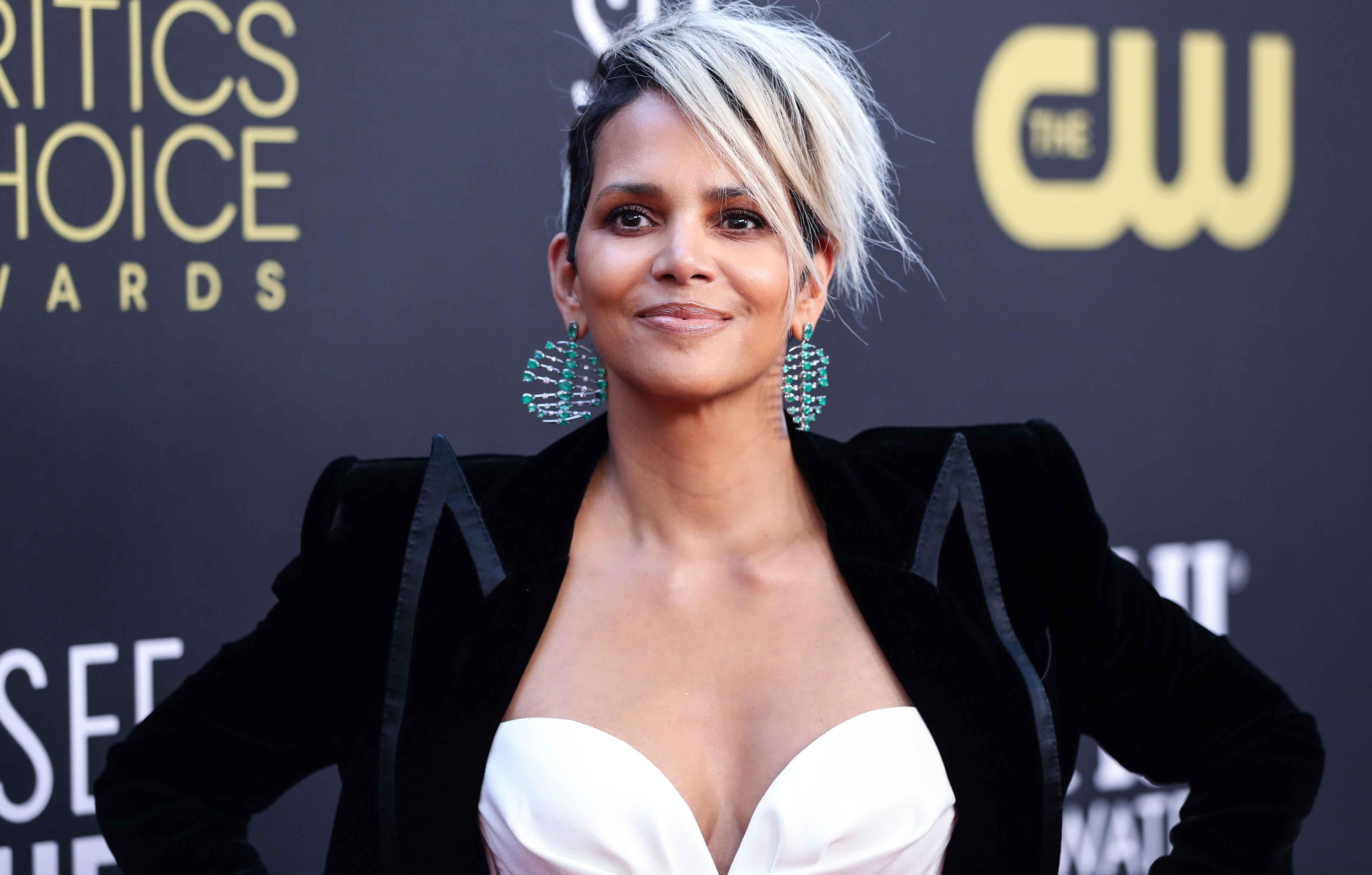 ufc fighter drops lawsuit halle berry netflix film bruised