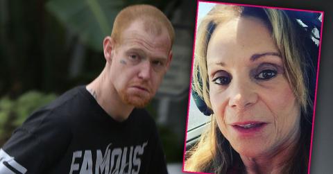 Redmond O'Neal in Black Footbal Jersey That Reads Famous With Inset Of Mela Murphy