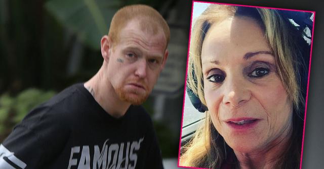 Redmond O'Neal in Black Footbal Jersey That Reads Famous With Inset Of Mela Murphy