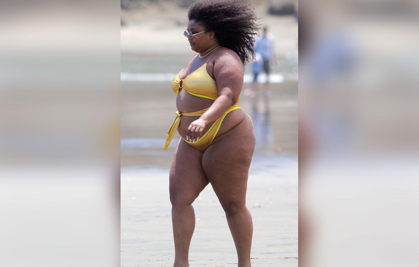 Lizzo Shows Off Curves In Gold Bikini During Beach Day: Photos