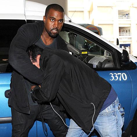 //kanye west pap scuffle