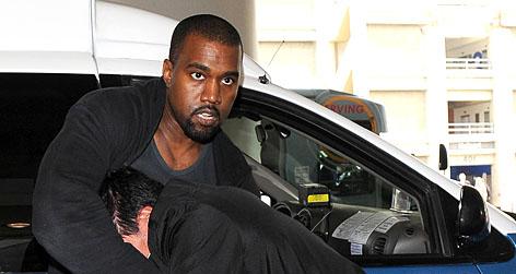 //kanye west pap scuffle