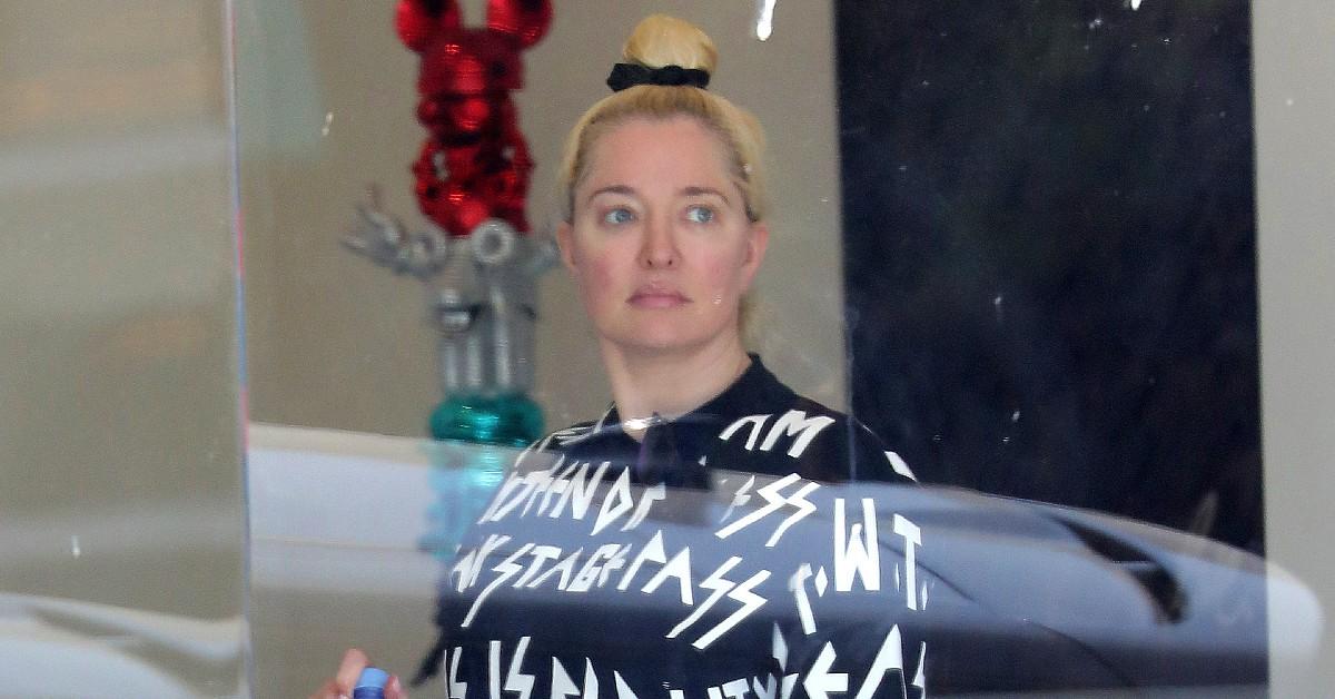 Erika Jayne Looks Worse For Wear Picking Up Toilet Paper As Embezzl...