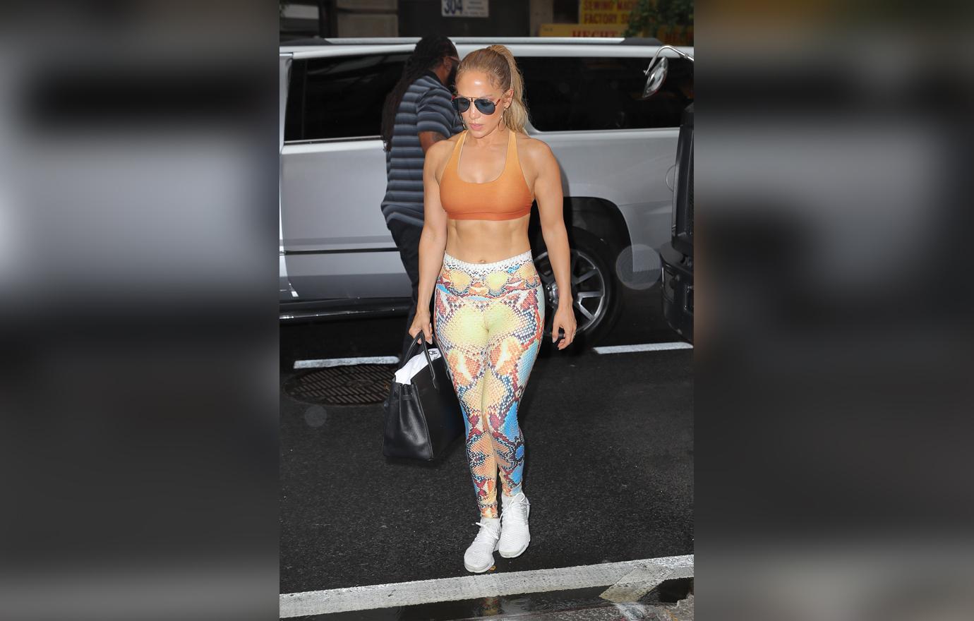 Jennifer Lopez Shows Off Abs To Distract From A Rod Engagement Rumors.