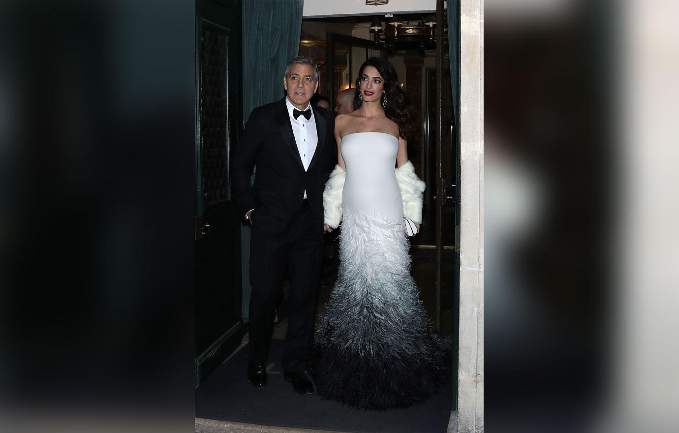 //amal clooney pregnant twins paris fashion week george clooney