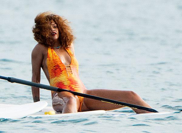 //rihanna swimsuit paddleboarding photos