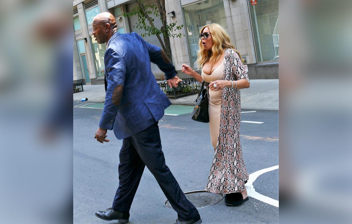 Wendy Williams Shows Off Busty Chest In Form Fitting Maxi Dress