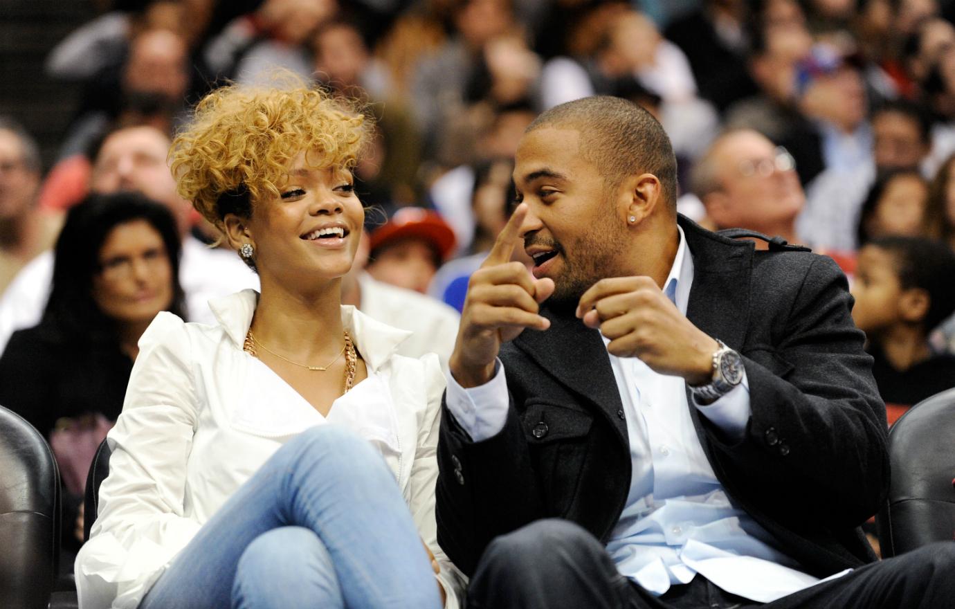 Baseball star Matt Kemp wore a black jacket over a white dress shirt with grey slacks, while Rihanna dazzled in a white shirt and faded blue jeans.