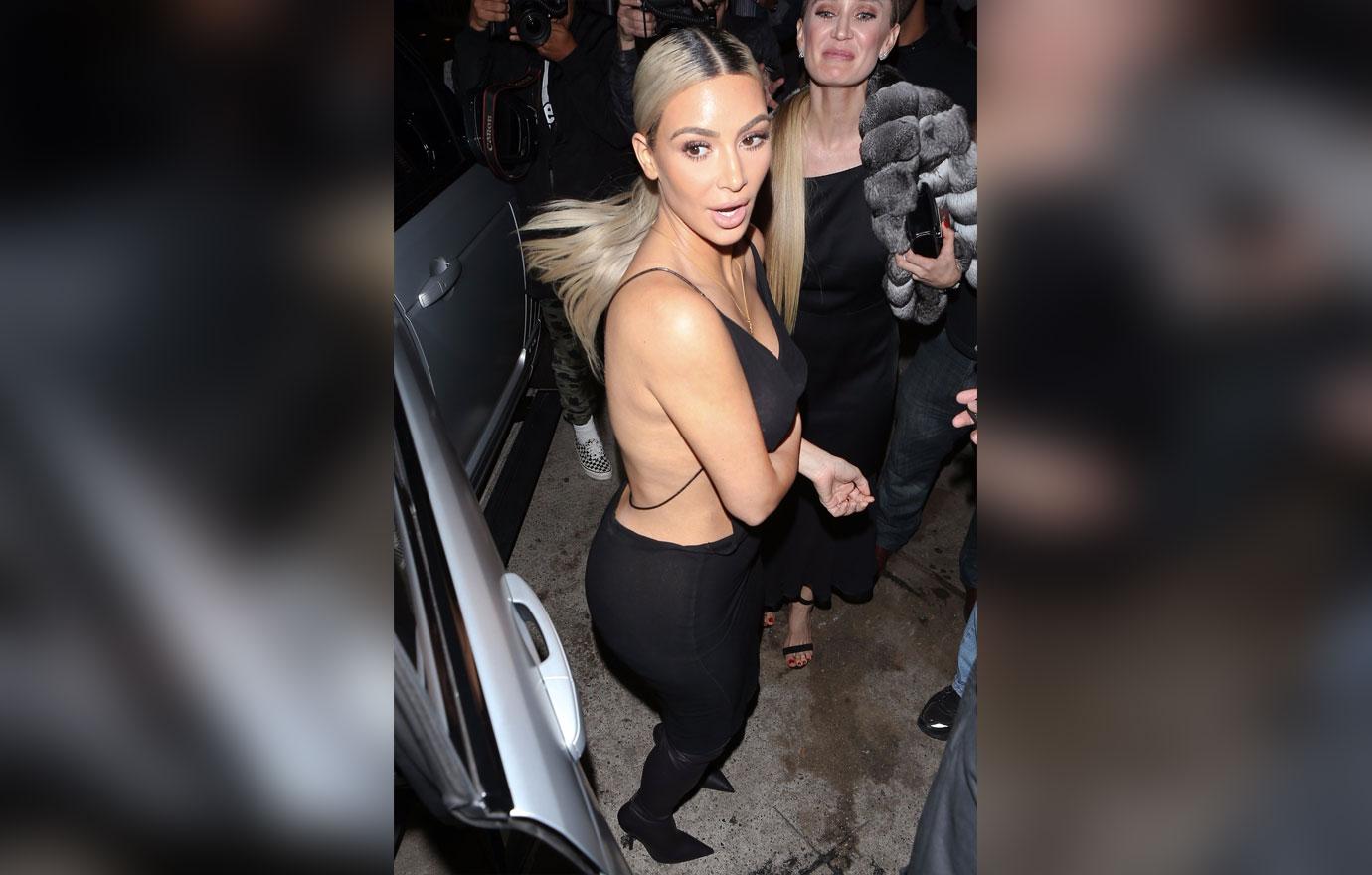 Kim Kardashian Shows Off Side Boob In Sheer Dress