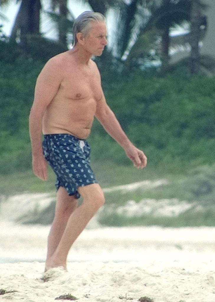 Michael Douglas Goes Shirtless On The Beach For Sad Swim