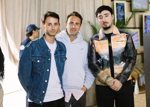 zack bia attends the evian x coperni miami design week event at soho beach house miami to celebrate the newly launched evian x coperni limited edition bottle