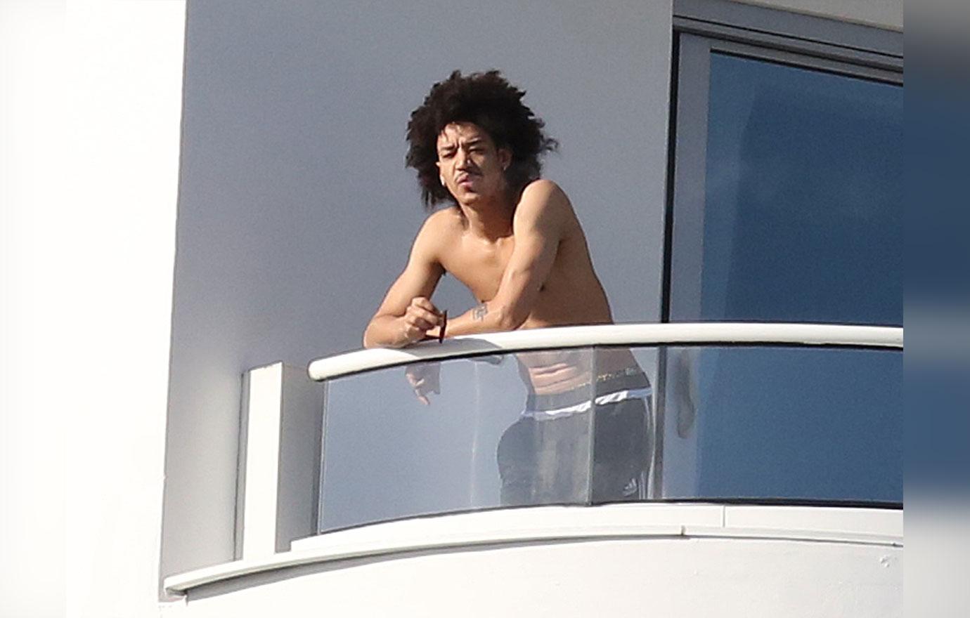 Madonna's Shirtless New Boytoy Ahlamalik Preens On Balcony