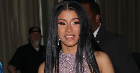 Cardi B wears a sparking pink dress at an event with Offset.