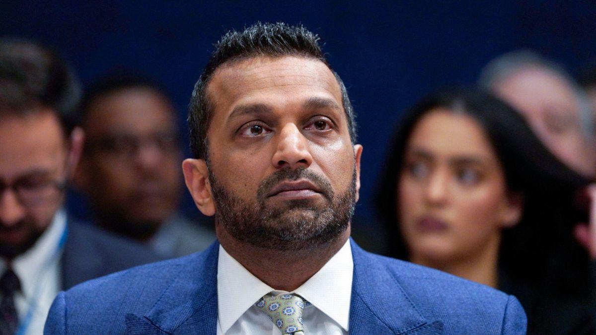 image of Other clips showed Patel crouched inside the venue as attendees sheltered in place.