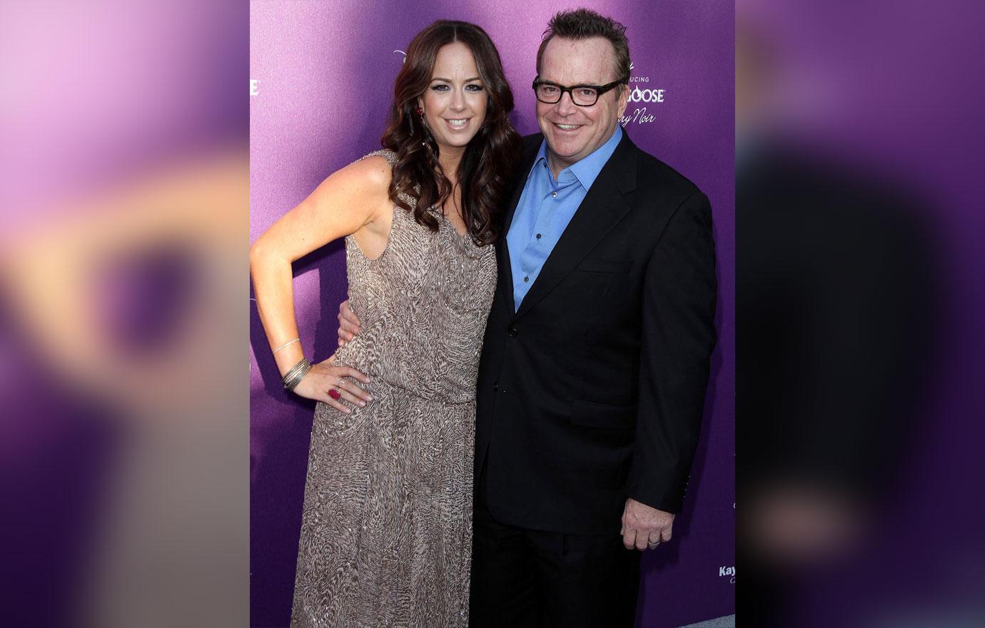 tom arnold divorce fight ex wife  million