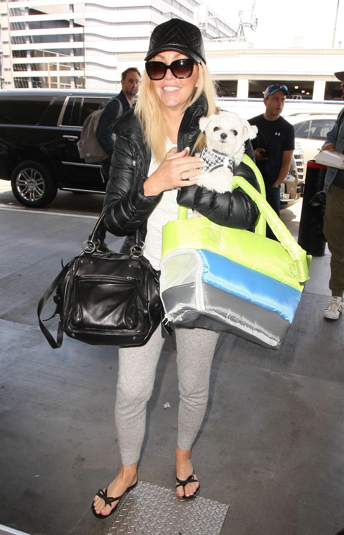 Heather Locklear is said to believe Lorenzo Lamas is 'the real deal' despite his history of multiple marriages.