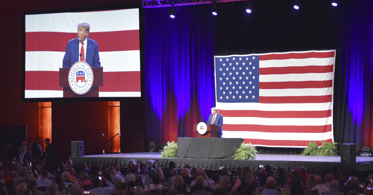 donald trump campaigning from behind the defendants table